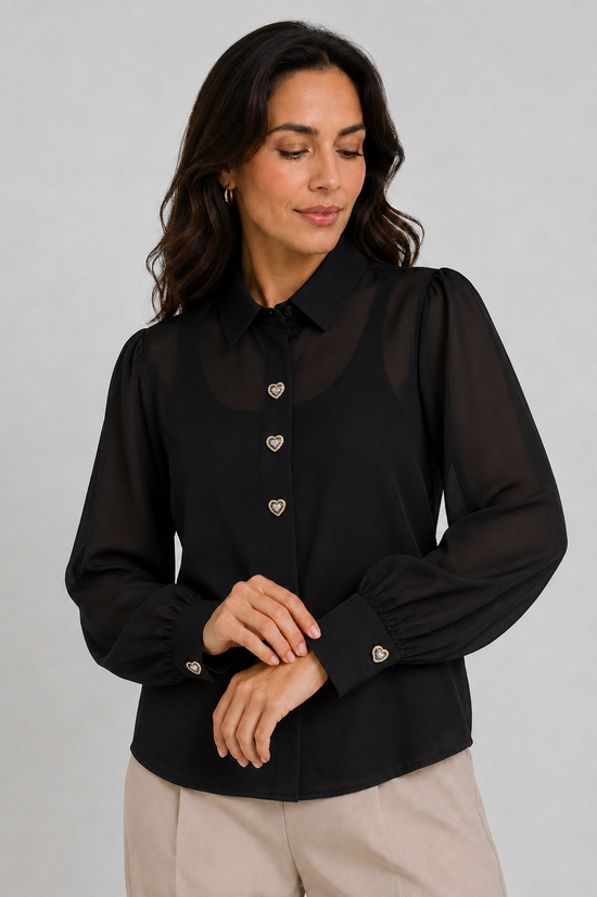 Blusa con botones decorativos