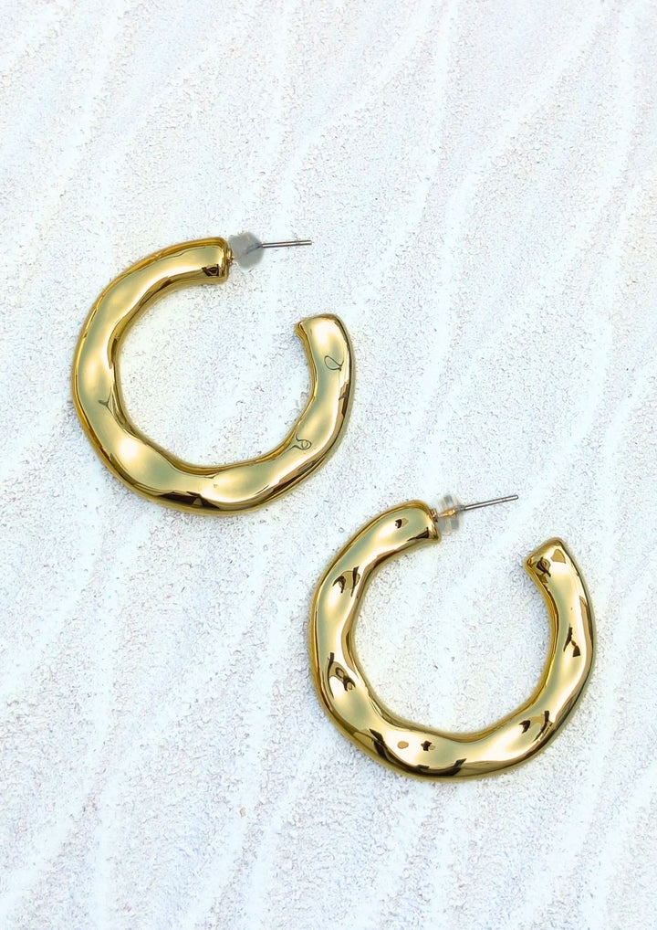 Aretes con ondas