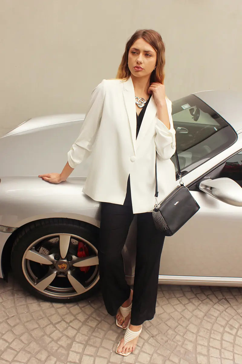 Saco oversize con botón en manga