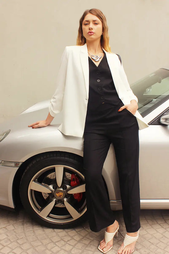 Saco oversize con botón en manga