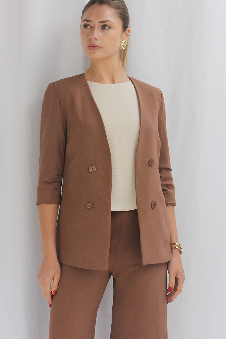 Chaqueta 3/4 botón lateral