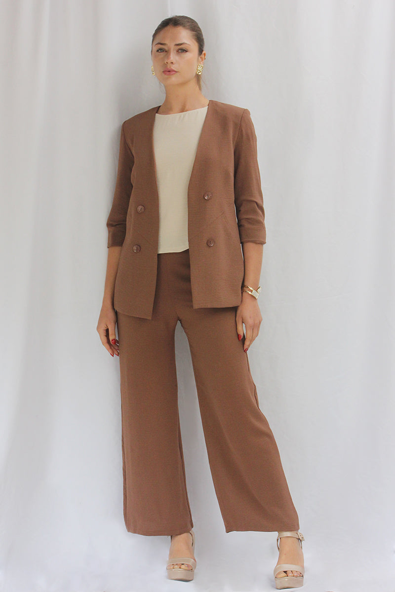 Chaqueta 3/4 botón lateral