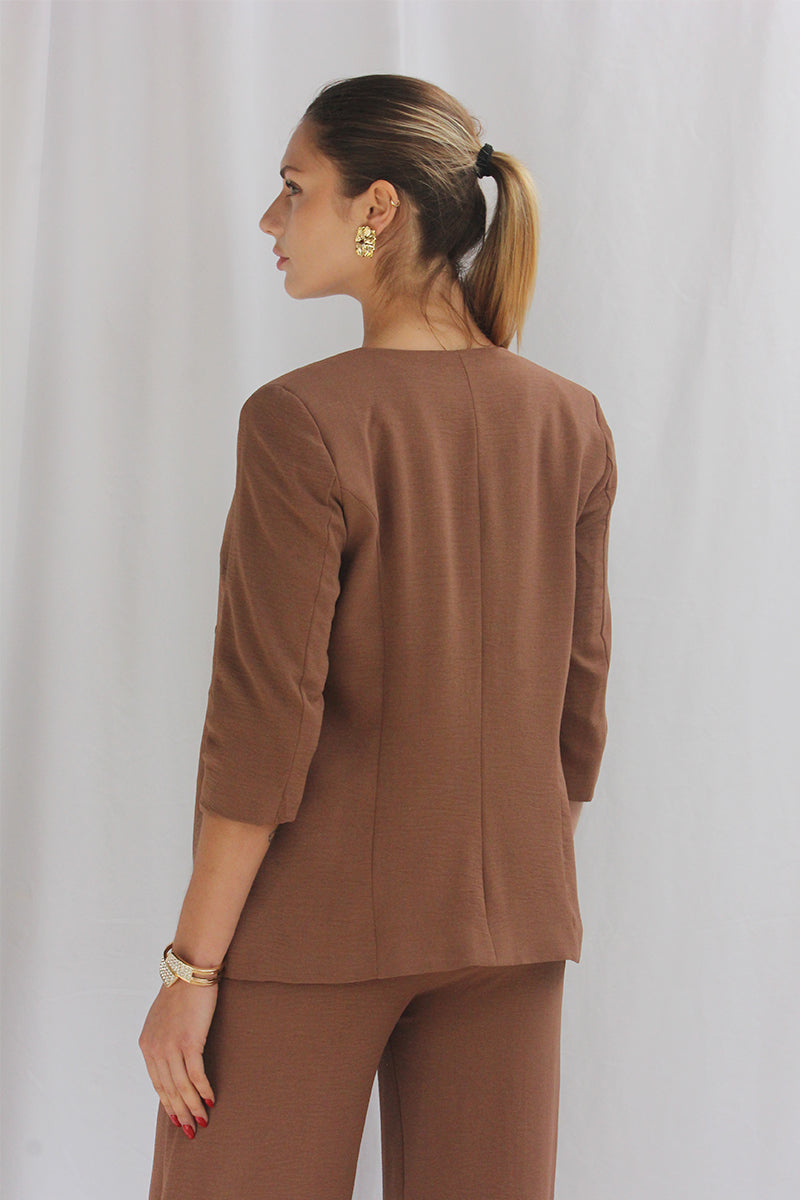 Chaqueta 3/4 botón lateral