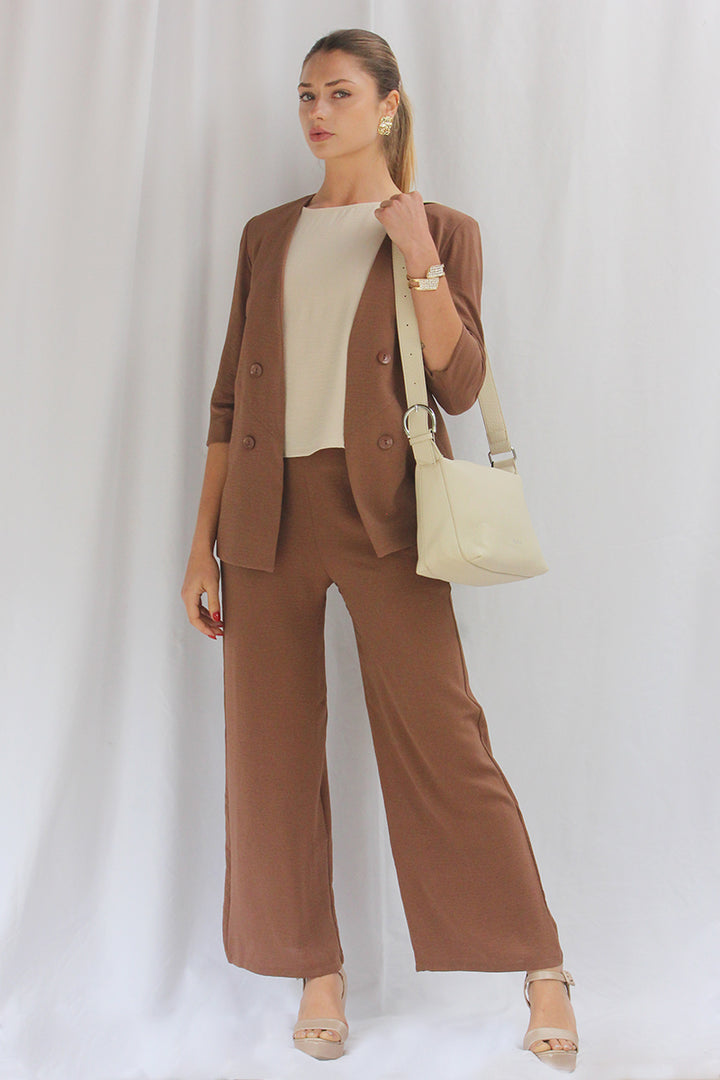 Chaqueta 3/4 botón lateral