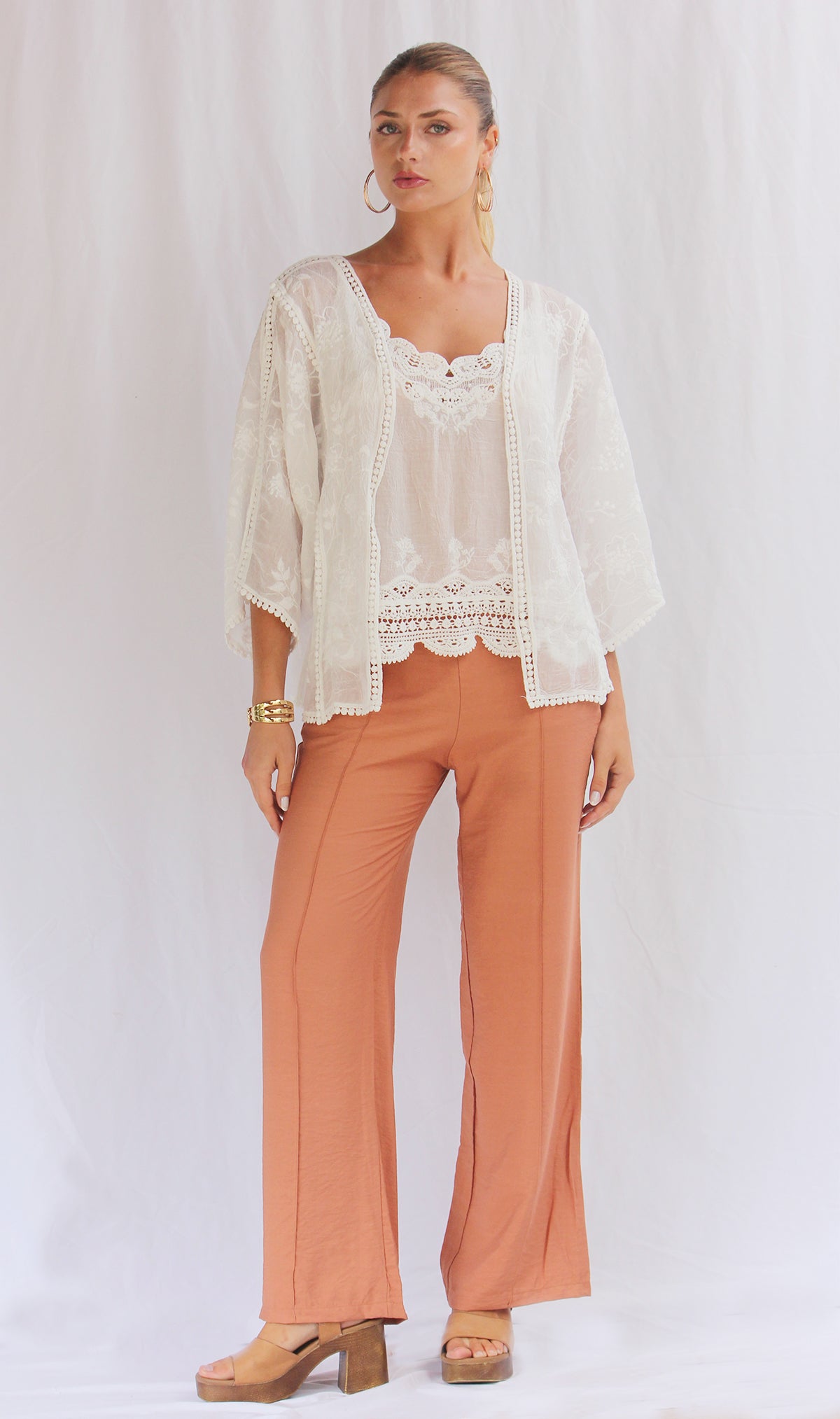 Conjunto de top con capa tejida