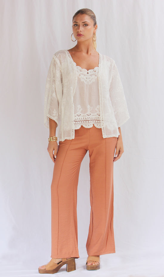 Conjunto de top con capa tejida