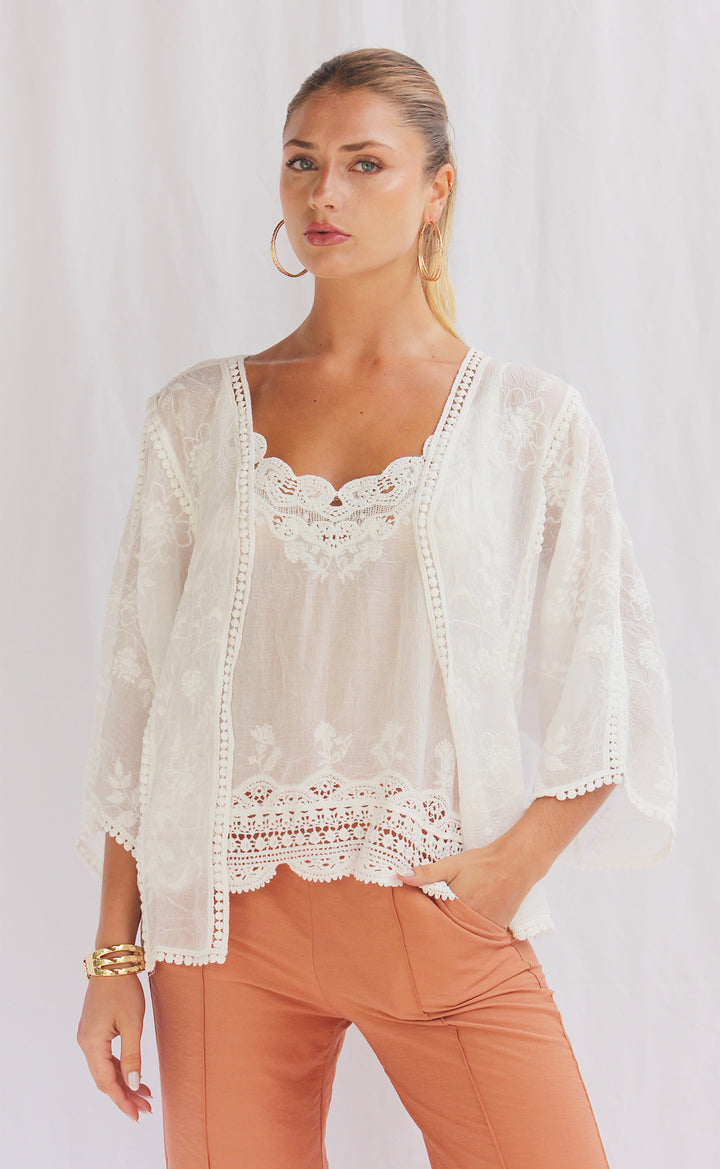 Conjunto de top con capa tejida