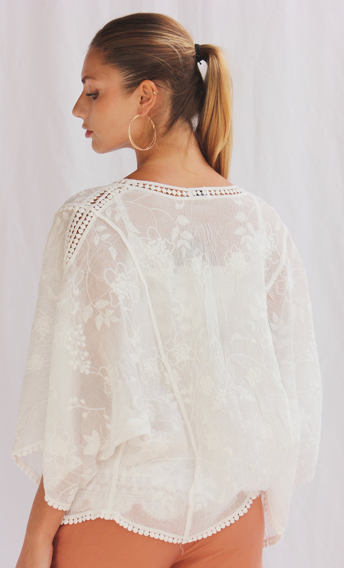 Conjunto de top con capa tejida