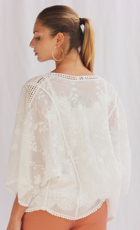 Conjunto de top con capa tejida