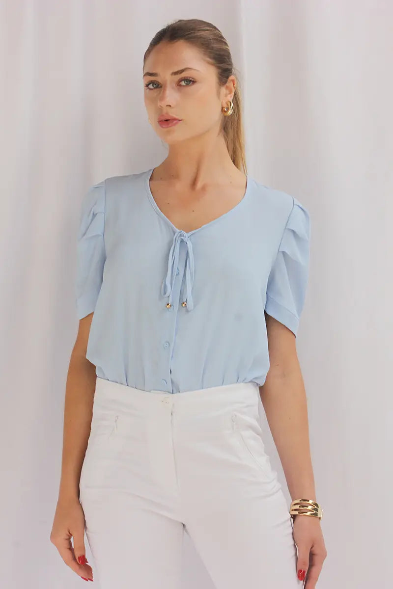 Blusa con pliegue en hombros