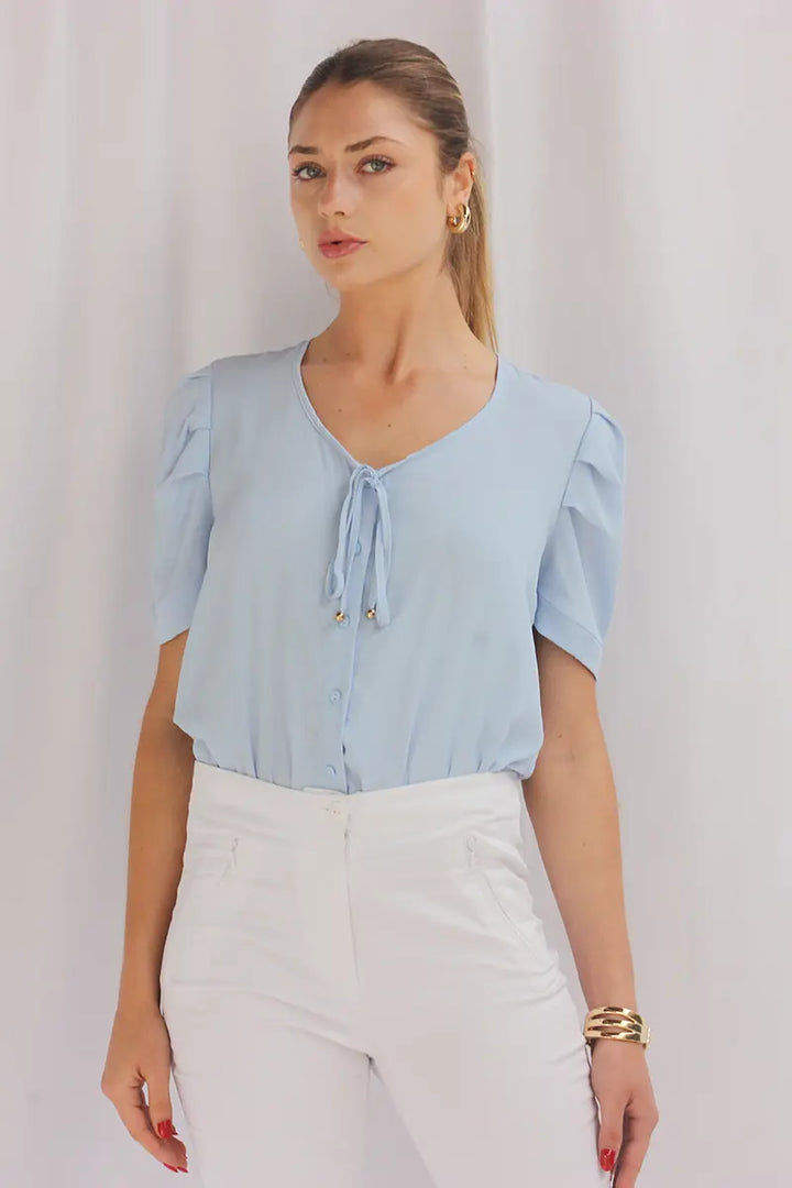 Blusa con pliegue en hombros