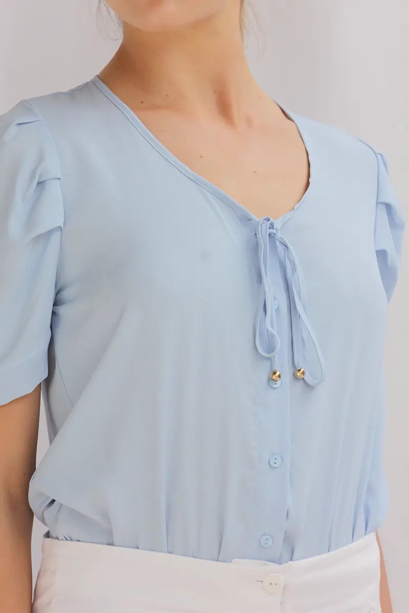 Blusa con pliegue en hombros