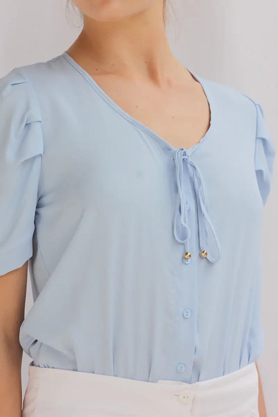Blusa con pliegue en hombros